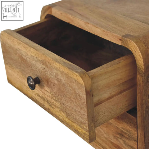 Mini curve floating bedside table in solid mango wood with natural grain and dark metal knob wall-mounted design