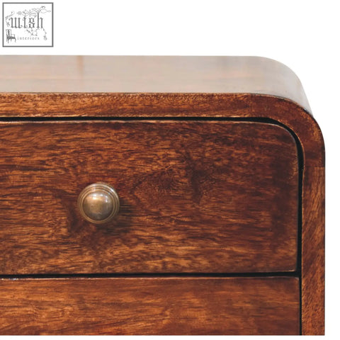 Mini curved california walnut wall mounted bedside table with rich brown wooden drawer and polished brass knob