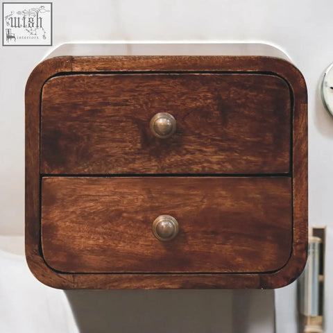 Mini curved california walnut wall mounted nightstand in rich dark brown wood with two drawers and brass knobs
