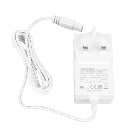 White plastic ac adapter with uk plug and coiled cord for litre mini fridge cables and power supply