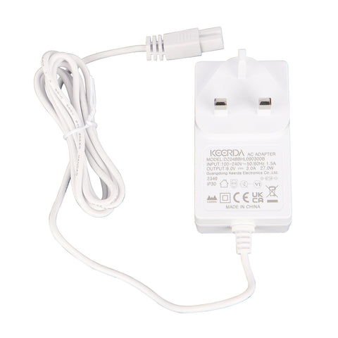 White plastic ac adapter with coiled cord and uk plug for litre mini fridge power connection