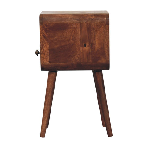 A rustic wooden mini honey caramel curved bedside table with warm brown finish and open slot for storage