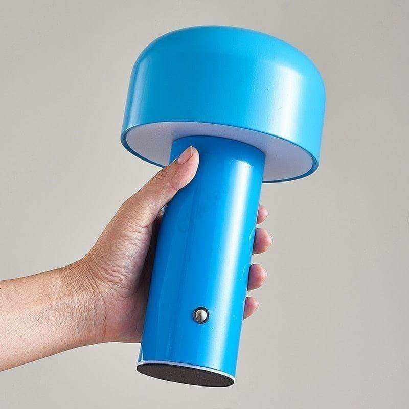 Bright blue mini mushroom lamp with smooth glossy finish and cylindrical base perfect for desk lighting