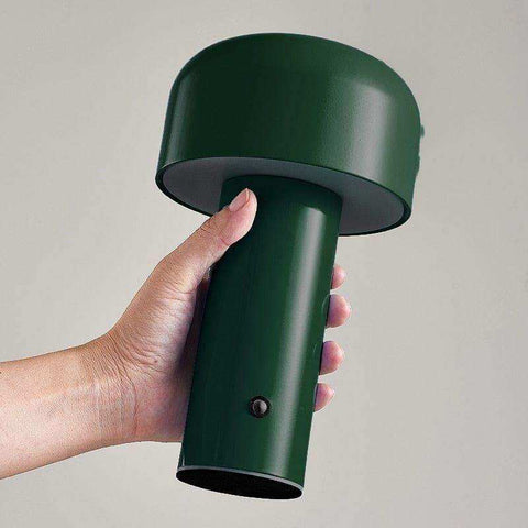 Dark green matte metal mini mushroom lamp with cylindrical base and rounded top from mini mushroom lamps collection