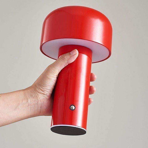 A vibrant red mini mushroom lamp with a glossy finish and cylindrical base perfect for desk lighting