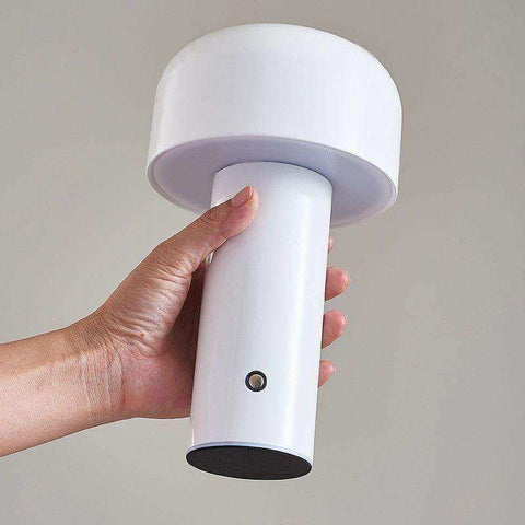 White mini mushroom lamp with rounded dome top and black base perfect for desk lighting and decor