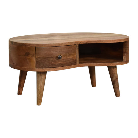 Rustic oval mini oak-ish wave coffee table with natural wood finish, one drawer, and open shelf on the right side