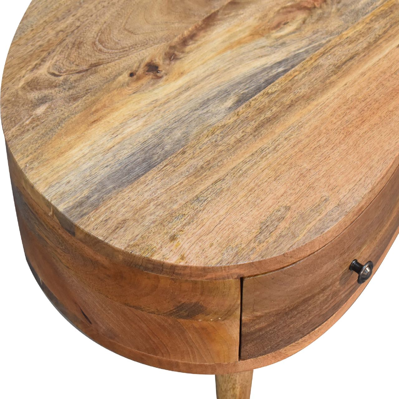 A rustic mini oak-ish wave coffee table with natural wood finish visible grain and a single drawer with metal knob