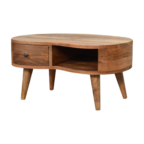 A rustic oval mini oak-ish wave coffee table with warm natural wood finish and tapered legs