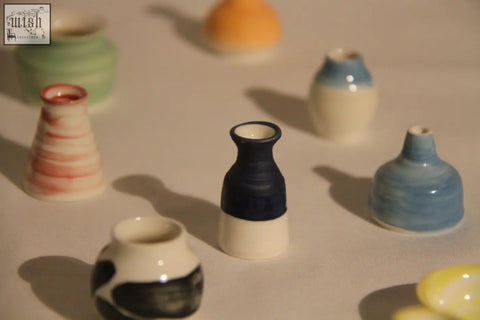 A sleek navy and white ceramic mini pot with a glossy finish perfect for your mini pot mystery box collection