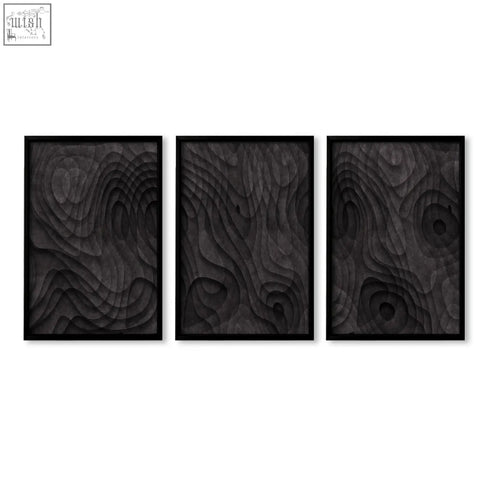 Three black-framed wood relief art prints with layered dark charcoal topographic wave patterns minimalist art set of 3