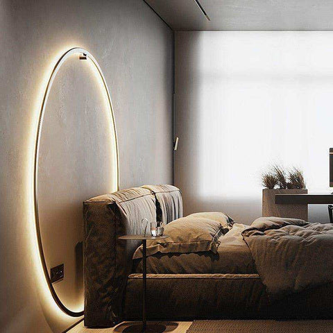 A sleek oval minimalist led wall ring light mirror with glowing led wall ring light frame for modern decor