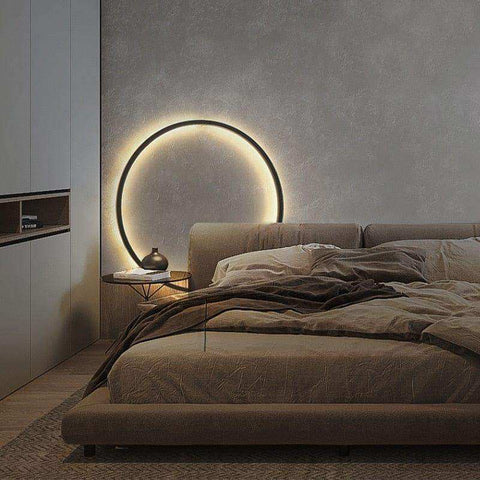 Minimalist led wall ring light with a sleek black frame and warm glowing illumination as a stylish ring light
