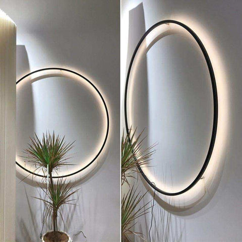 Modern oval wall ring light with sleek black frame and glowing circular led ring perfect minimalist led wall ring light
