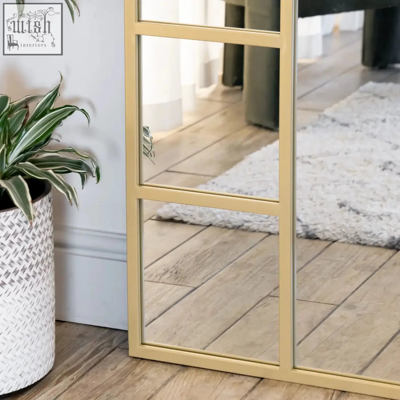 Gold metal arched full length window mirror with grid of rectangular panes measuring 180cm by 90cm