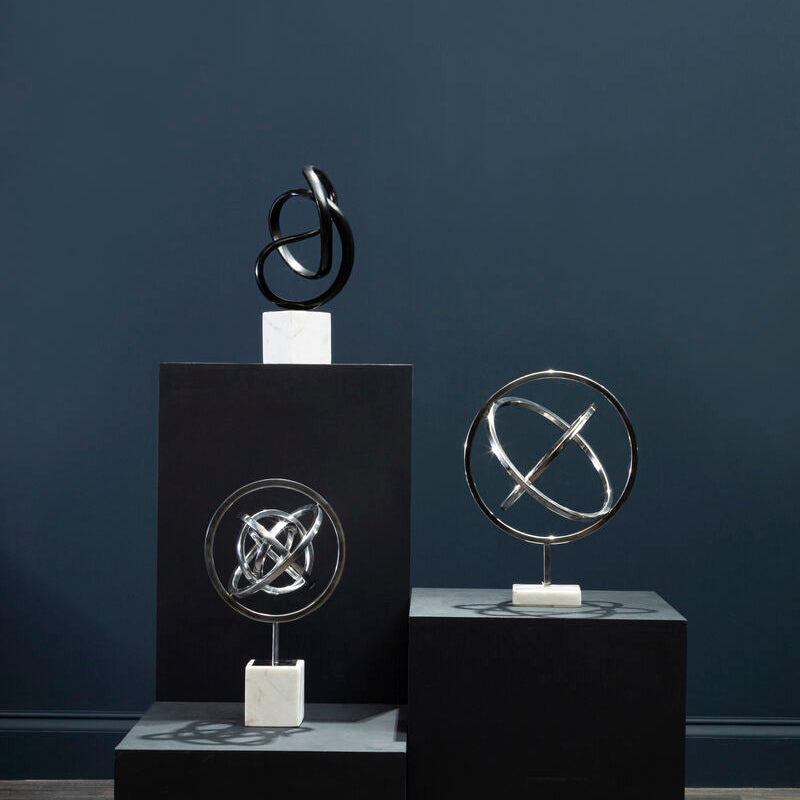 Mirano silver finish spiral silver sculpture with black chrome metal on bright silver separate white marble base