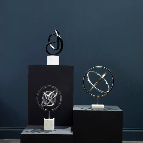 Mirano silver finish spiral silver sculpture with black chrome metal on bright silver separate white marble base
