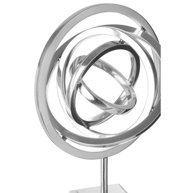 Shiny bright silver sculpture with interlocking circular rings on a separate base called mirano silver finish spiral sculpture