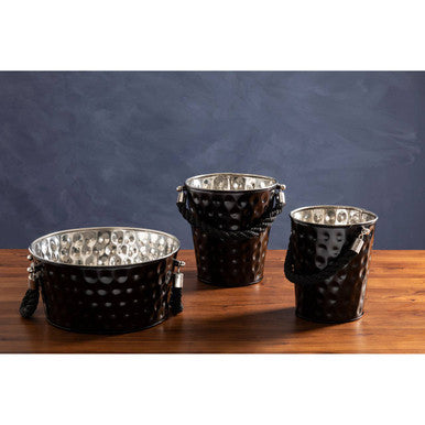 Set of three small black party hammered metal candle holders with silver interiors and decorative handles