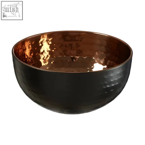 Miressa small hammered serving bowl with black hammered metal exterior and contrasting copper interior ideal for serving