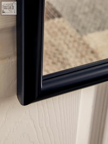 Black framed over door mirror with sleek modern design featuring mize black plastic frame and durable plastic frame material
