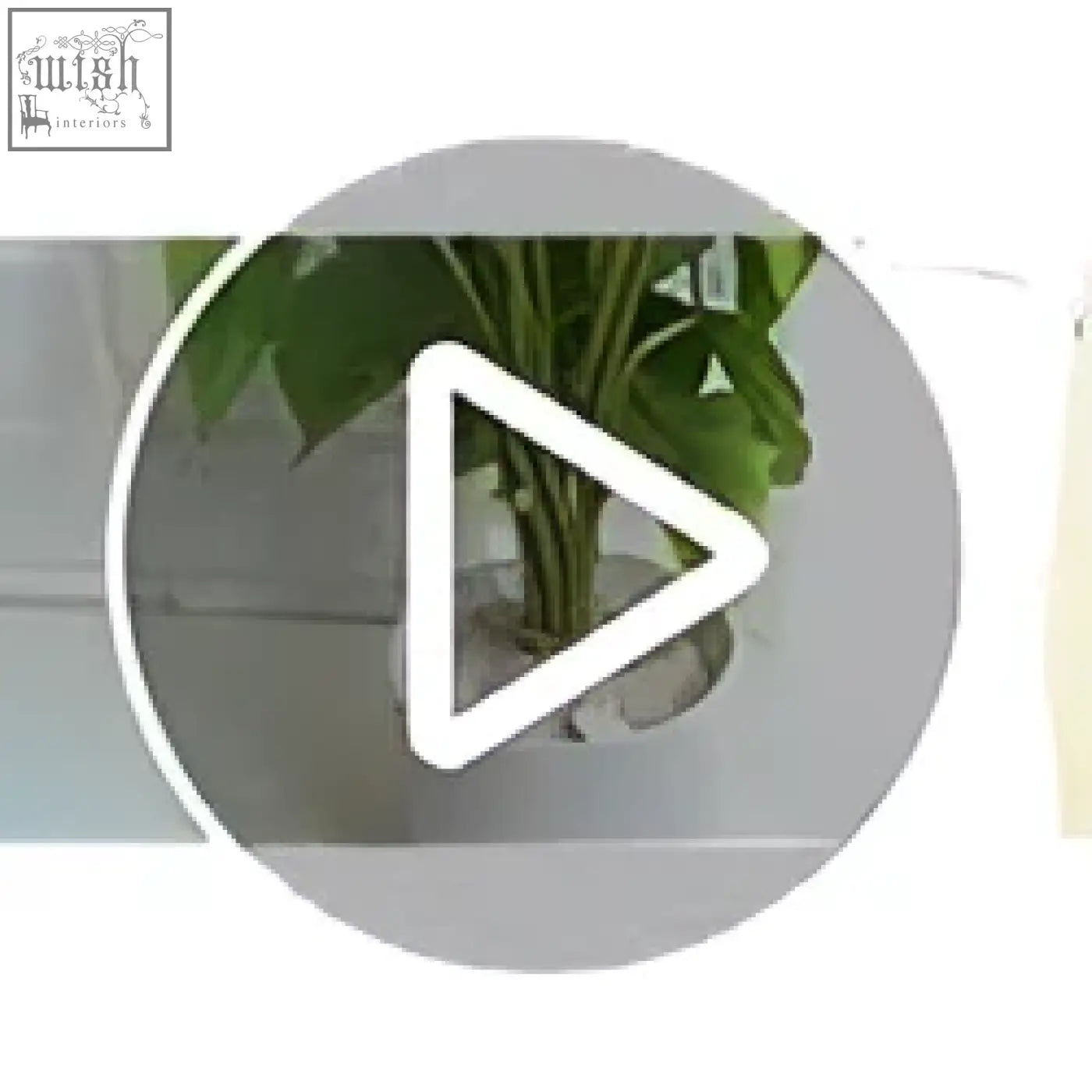 A sleek white play button icon on a soft gray circle for mkono modern white ceramic pot potted plant decor