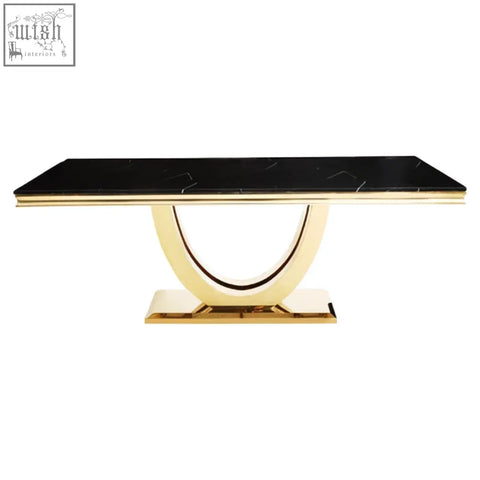 Moda black faux marble rectangular dining table with sleek curved gold metal base for stylish dining spaces