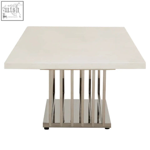 Modern white faux marble coffee table with sleek glossy top and silver finish frame with chrome legs