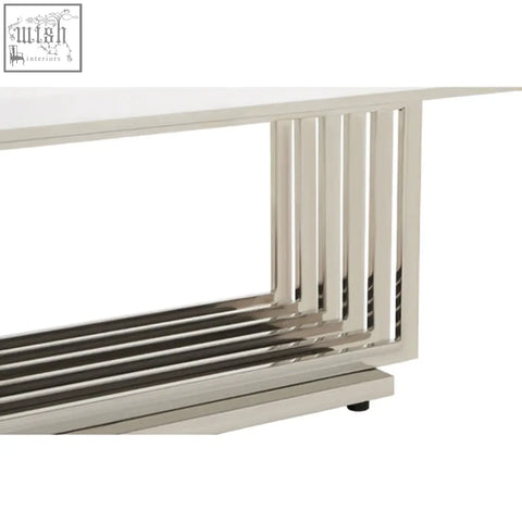 Modern silver metal coffee table with vertical slats and faux marble top for a sleek marble coffee table look