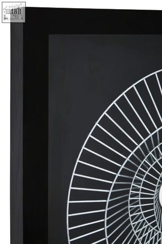 Black framed modello silver and black wall art with white concentric circles on dark background perfect focal point wall art