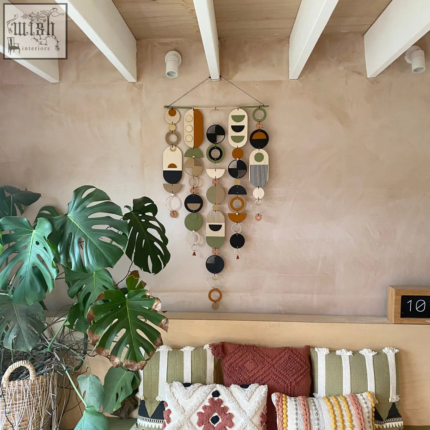 Modern art wooden wall hanging with hand painted earthy geometric shapes won design awards for wall art decor