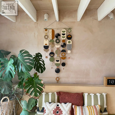 Modern art wooden wall hanging with hand painted earthy geometric shapes won design awards for wall art decor