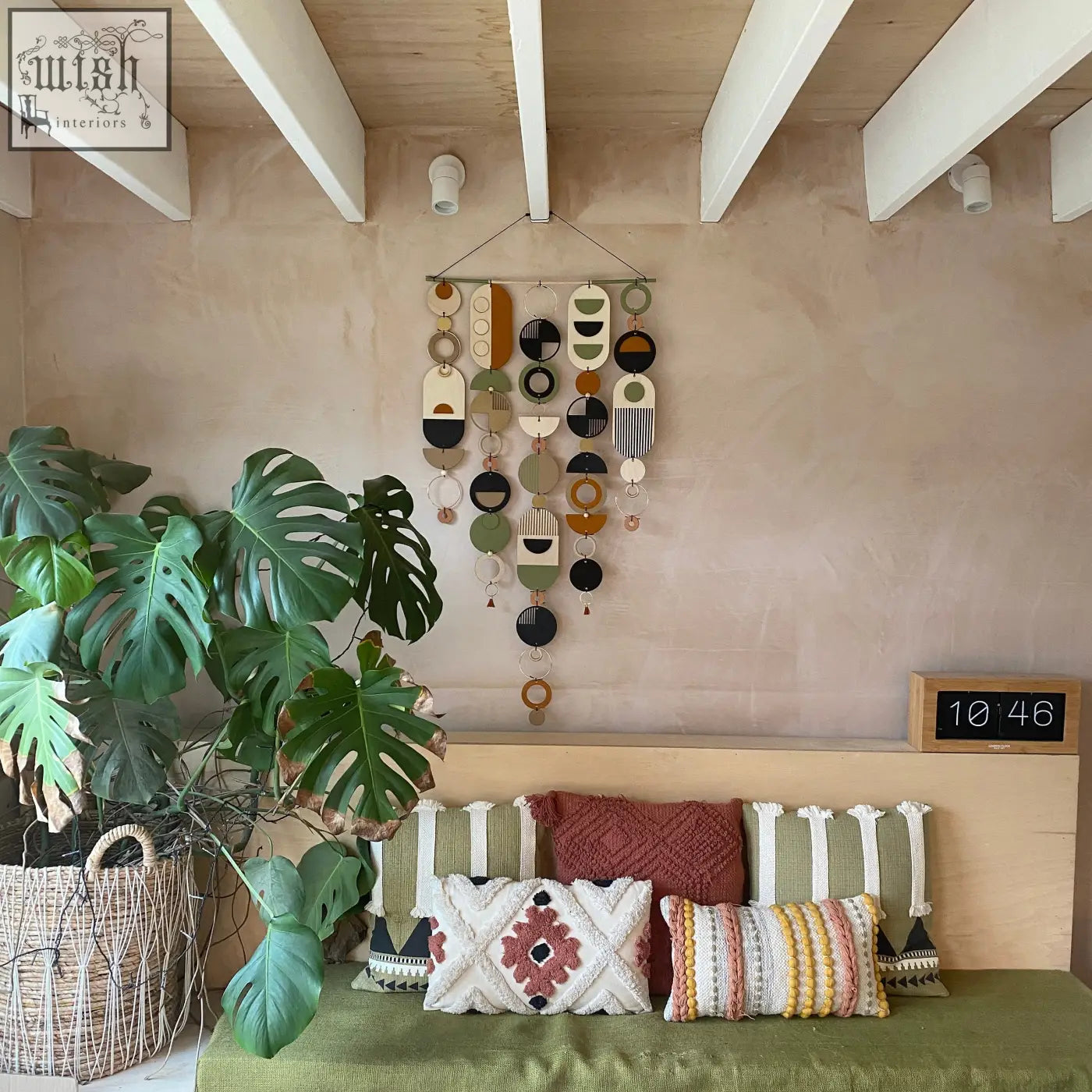 Modern art wooden wall hanging with hand painted geometric discs in earthy tones winner of design awards 2022 wall art