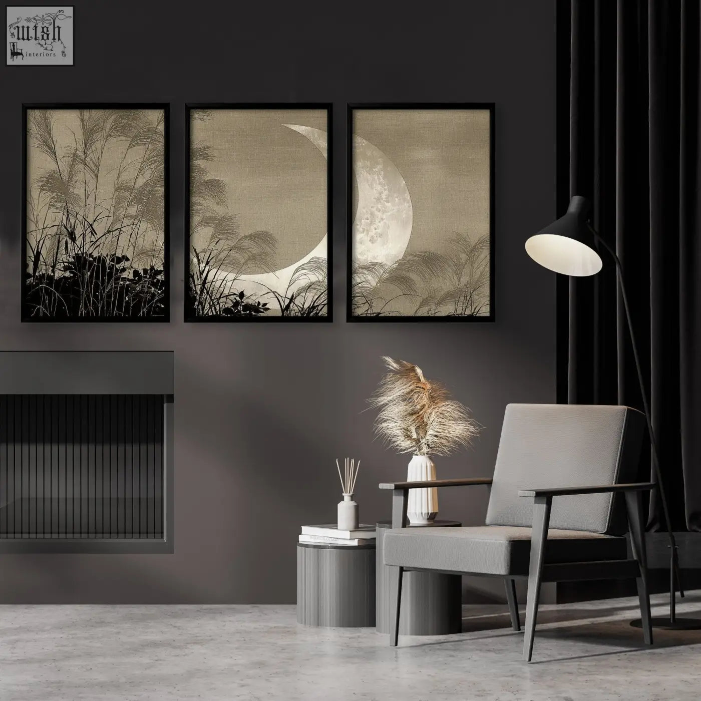 Gray upholstered armchair with dark wooden frame and slender legs next to modern asian wall art crescent moon prints set