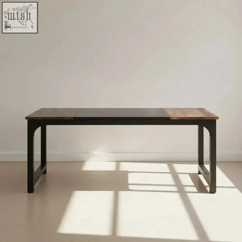 Industrial-style modern conference table with dark wood top and black metal legs designed for computer use