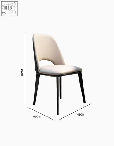Cream-colored upholstered modern contexture dining chair with sleek black metal legs and cutout back design