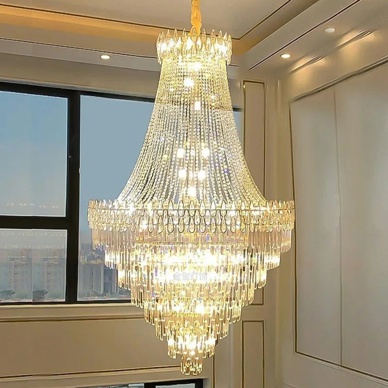 A modern crystal chandelier with clear faceted crystals and warm golden light perfect for hotel hall or wedding villa