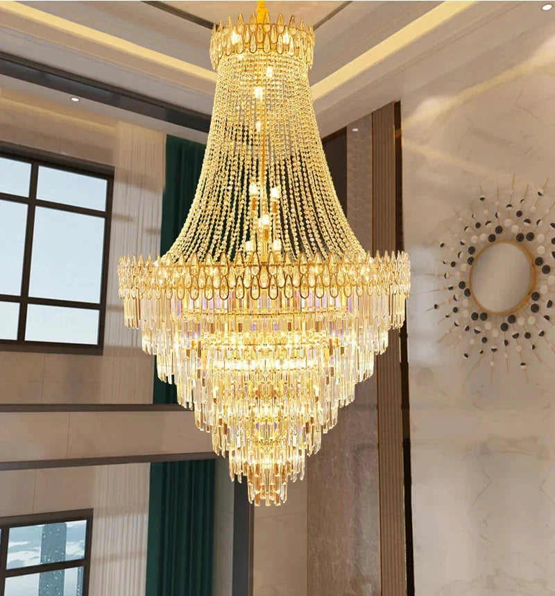 Modern crystal chandelier with golden accents and cascading glass prisms perfect for hotel hall and villa living room