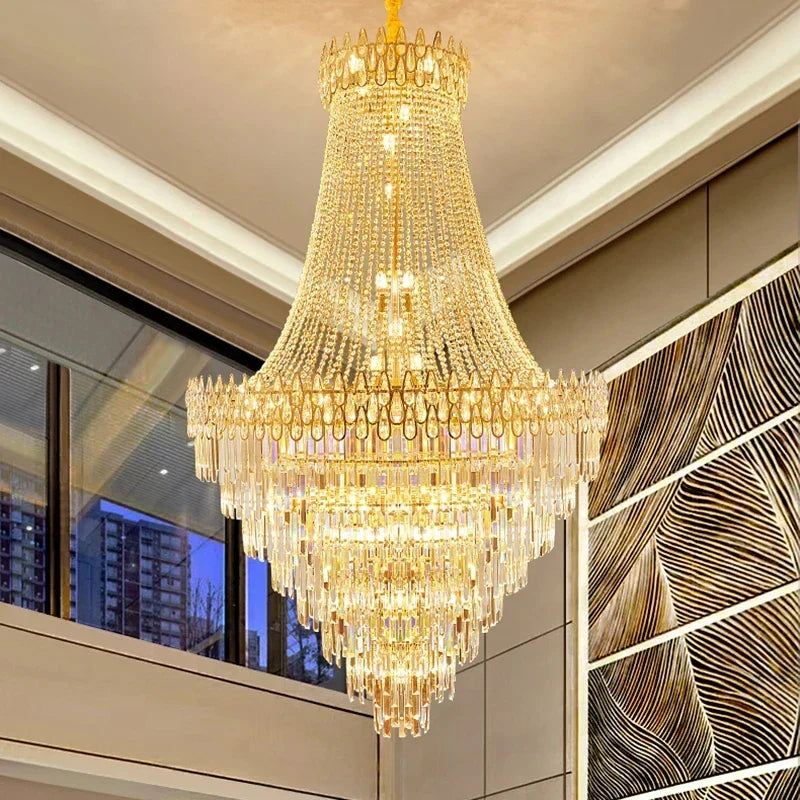 Modern crystal chandelier with golden tiers of glass prisms and a decorative crown perfect for hotel hall and villa use