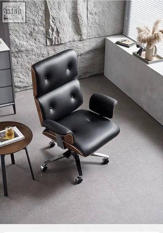 Modern e69 high back office chair in black premium leather with walnut wooden accents and chrome base