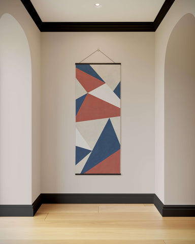 Modern geometric triangle tapestry with bold navy blue terracotta red and white triangles on minimalist canvas