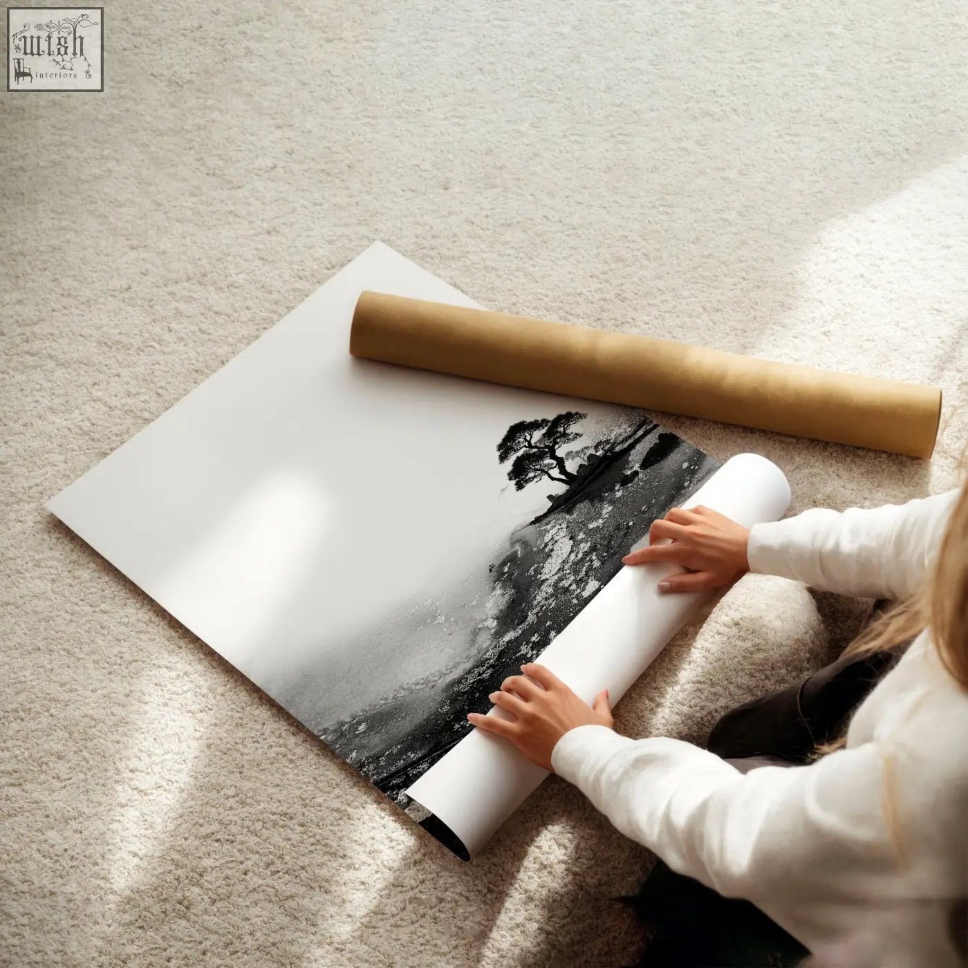 Rolled up black and white art print of a solitary tree on shoreline part of modern japanese art prints set