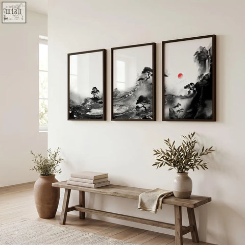 Three framed modern japanese art prints featuring black and white ink landscape with a red sun above a wooden bench