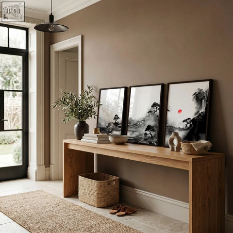 Minimalist wooden console table with natural finish and open storage below complementing modern japanese art prints set