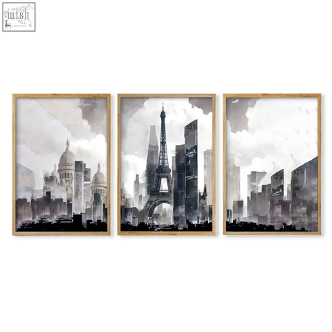 Set of three black and white paris cityscape wall art in light wood frames perfect for modern living room decor