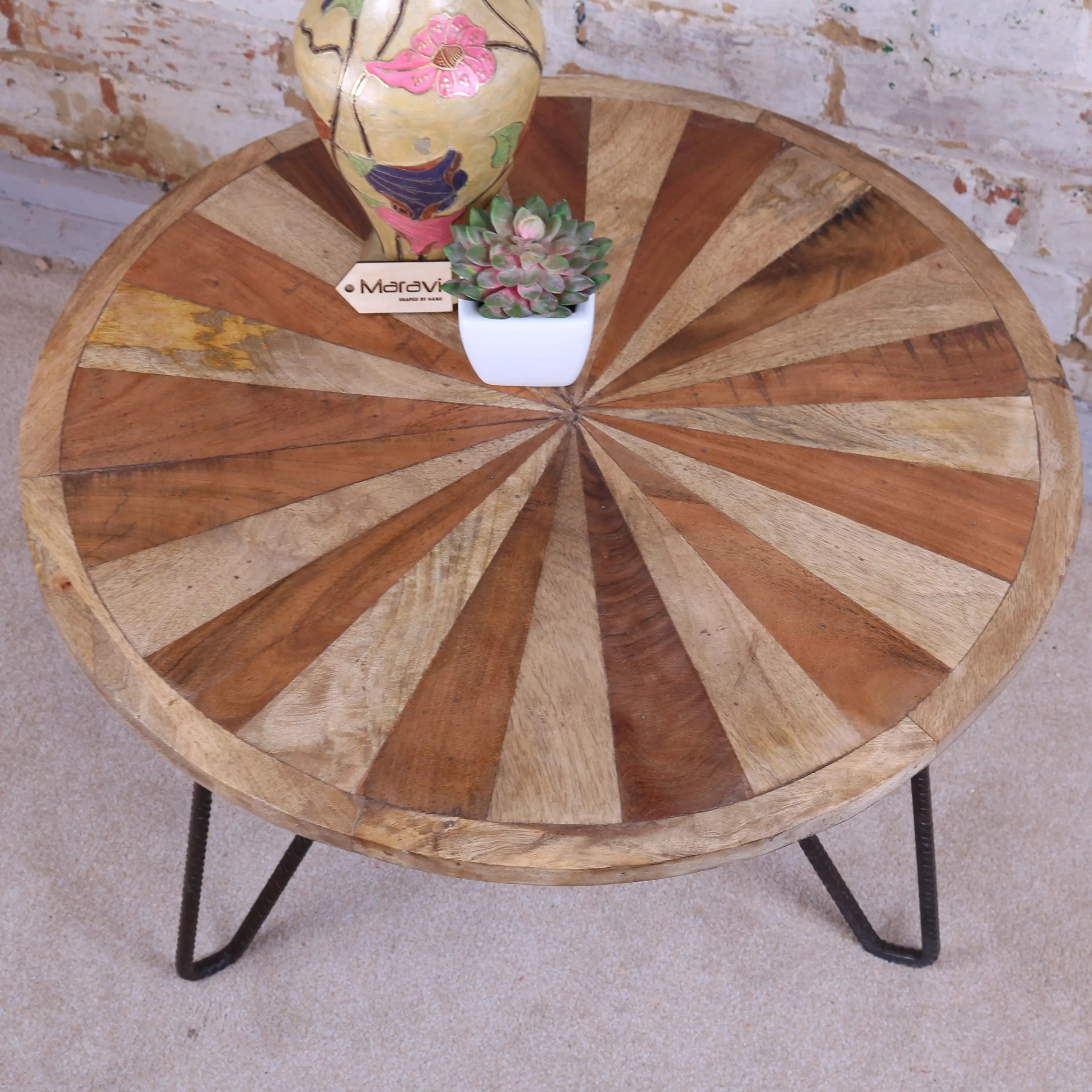 Mogas small round coffee table with radial wood pattern in brown tones and black metal hairpin legs