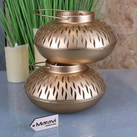 Mohra gold candle lantern set of 2 with gold metal double-tiered rounded design and leaf cutouts for candles
