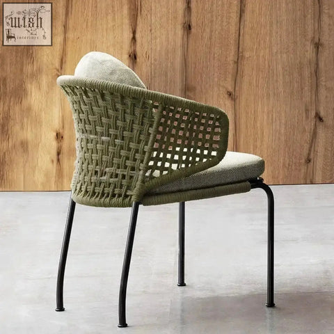 Olive-green mokusei chair with rope backrest black metal legs and light gray cushioned seat for comfy seating