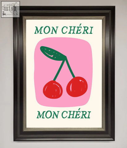 A mon cheri framed poster with bright red cherries and green leaves on pink background featuring teal text mon cheri