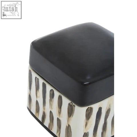 Mona brushstroke trinket box in black and cream ceramic with glossy black lid and vertical brushstroke pattern sides
